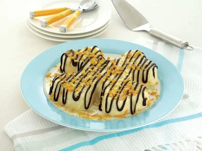 Çikolata Soslu Ve Portakal Kabuklu İrmik Tatlısı tarifi